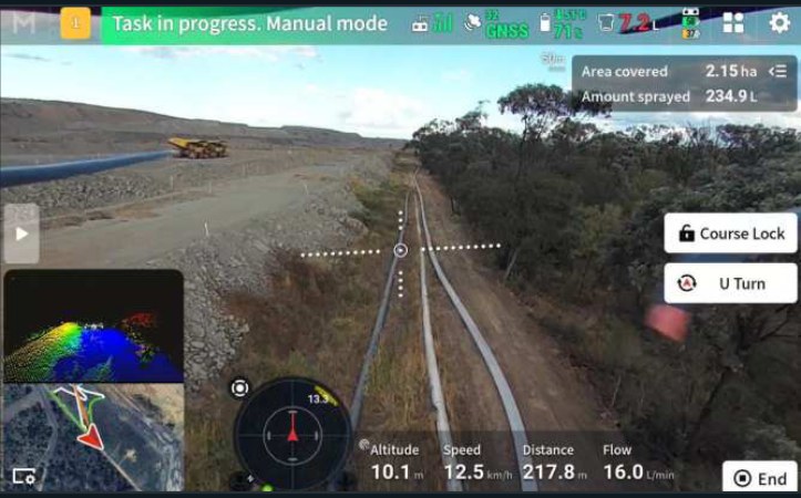Operator display during variable-rate application along a mine services corridor, showing live coverage and volume